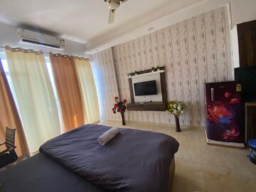 Living Room in Studio Apartment at Gaur City Center, Sector 4 Greater Noida – for Rent