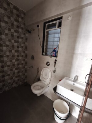 Bathroom in 1 BHK Apartment at Vihang Valley Phase 3, Kasarvadavali – for Sale