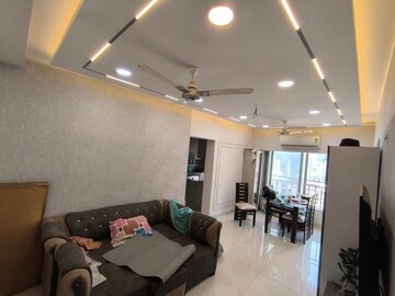 Living Room in 2 BHK Apartment at Riddhi Garden, Malad East – for Rent