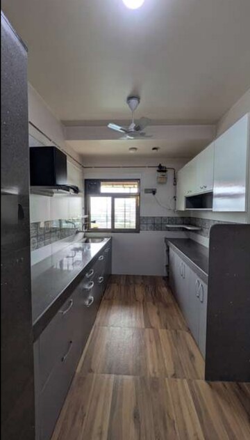 Kitchen in 2.5 BHK Apartment at Kalpataru Hills, Manpada – for Rent
