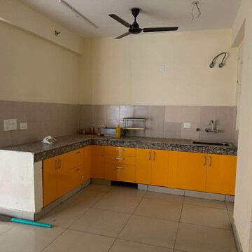 Kitchen in 2 BHK Apartment at Panchsheel Greens, Sector 16 Greater Noida – for Rent
