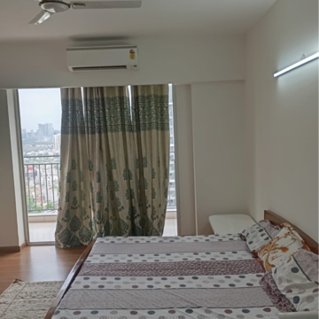 Bedroom in 3 BHK Apartment at Godrej Woods, Sector 43 – for Rent