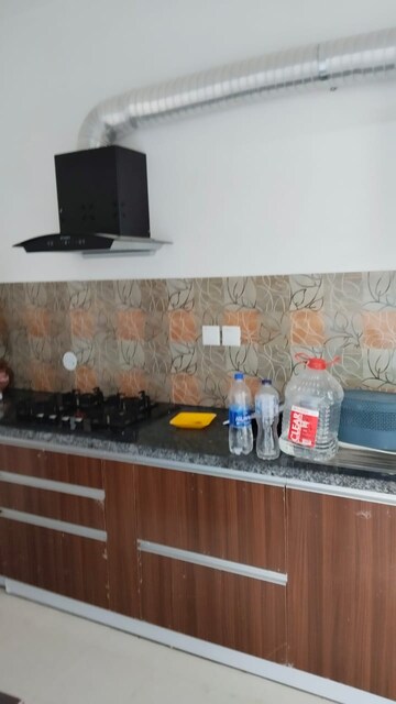 Kitchen in 2 BHK Apartment at Raheja Vedaanta, Sector 108 – for Rent