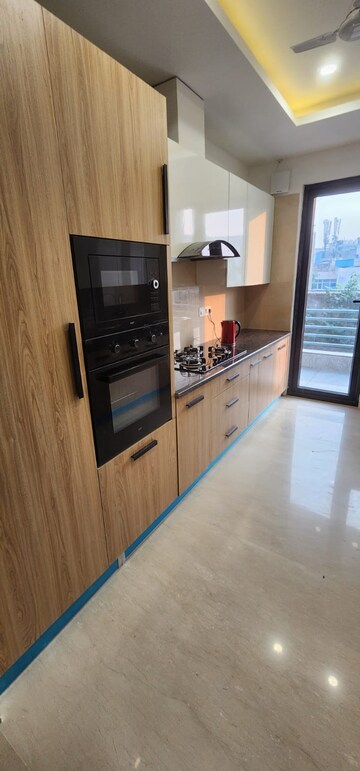 Kitchen in 4 BHK Builder Floor at DLF Green Avenue, Dlf Phase iv – for Rent