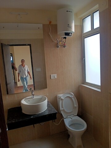 Bathroom in 2 BHK Apartment at Ansal Highland Park, Sector 103 – for Rent