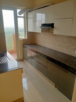Kitchen in 2 BHK Apartment at Ansal Highland Park, Sector 103 – for Sale
