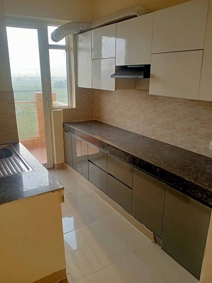 Kitchen, ansal-highland-park 2 Bedroom 1361 Sq.Ft. Apartment In Sector 103 Gurgaon 9097391