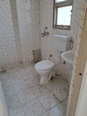 Bathroom in 2 BHK Apartment at Adore Happy Homes, Sector 86 – for Rent