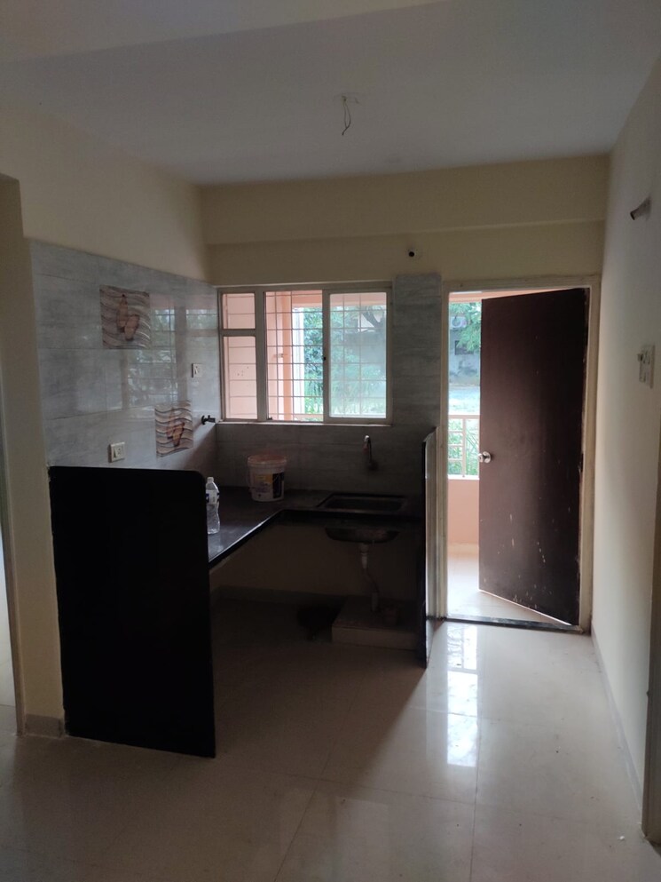 Kitchen, unecha-sai-srushti 2 Bedroom 788 Sq.Ft. Apartment In Wagholi Pune 9097444