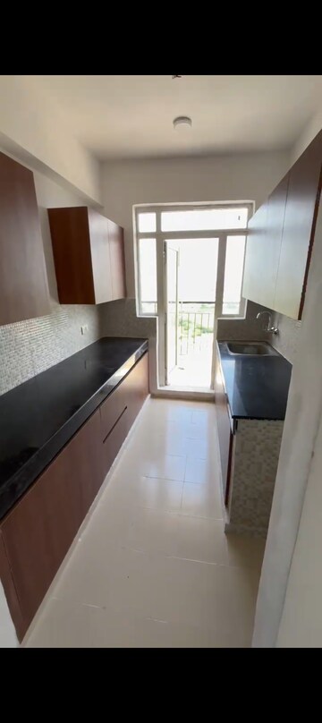 Kitchen in 2 BHK Apartment at Aditya Luxuria Estate, Dasna – for Sale