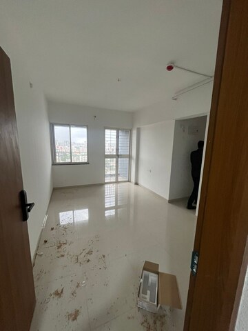 Building Lobby in 2 BHK Apartment at Triaa Kosmic Kourtyard, Wagholi – for Rent