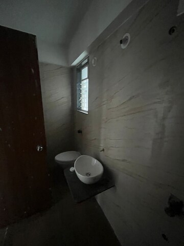 Bathroom in 2 BHK Apartment at Triaa Kosmic Kourtyard, Wagholi – for Rent