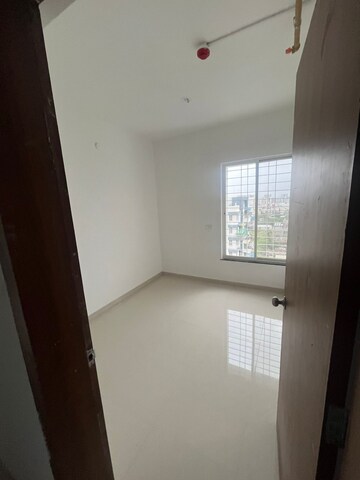 Room in 2 BHK Apartment at Triaa Kosmic Kourtyard, Wagholi – for Rent