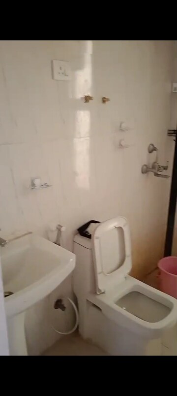 Bathroom in 2 BHK Apartment at Nilaya Greens, Raj Nagar Extension – for Sale