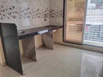 Kitchen in 1 BHK Apartment at Chaitanya Heritage, Karanjade – for Sale