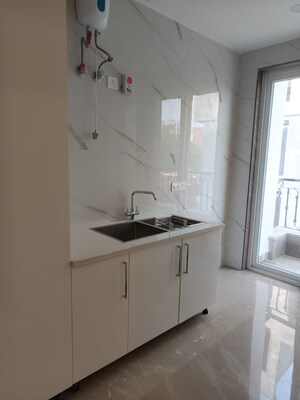 Kitchen in 4 BHK Builder Floor at Parklands, Sector 85 – for Sale