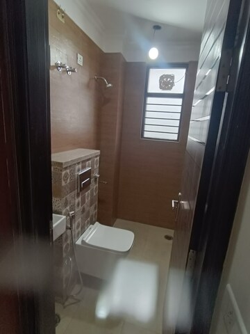 Bathroom in 4 BHK Builder Floor at Ansal API Esencia, Sector 67 – for Rent