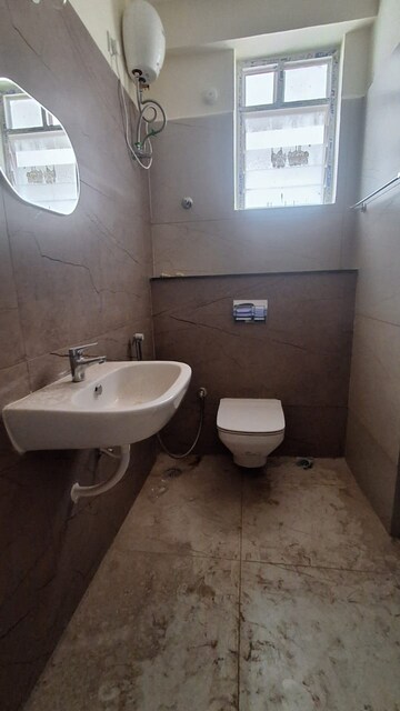 Bathroom in 3 BHK Apartment at Mahathi Jaswitha Cyber Nest, Kondapur – for Rent
