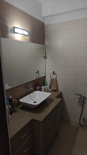 Bathroom in 3 BHK Apartment at Smart World Orchard, Sector 61 – for Rent