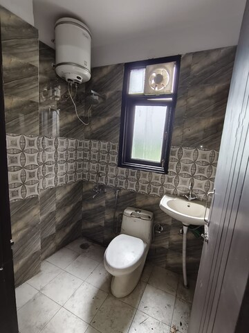 Bathroom in 2 BHK Builder Floor at Chattarpur – for Rent