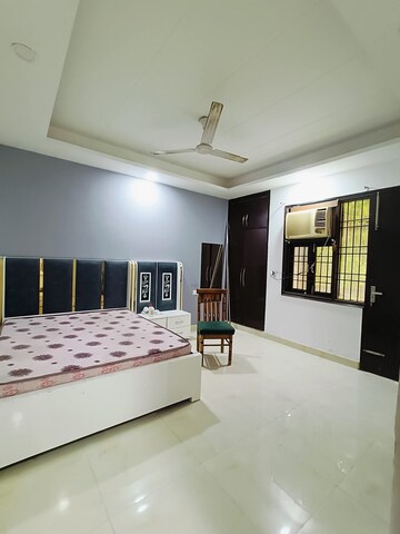 Bedroom in 3 BHK Builder Floor at Freedom Fighters Enclave – for Rent