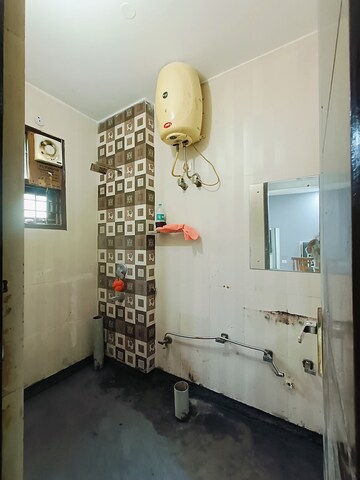 Bathroom in 3 BHK Builder Floor at Freedom Fighters Enclave – for Rent