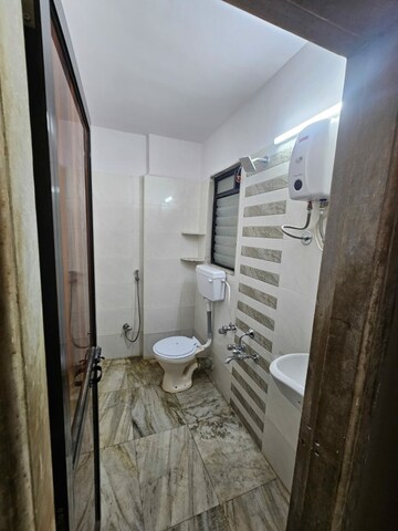 Bathroom in 2 BHK Apartment at Sankalp II, Malad East – for Rent