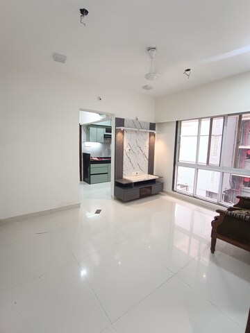 Living Room in 2 BHK Apartment at Dinaco Darshan CHS, Dahisar West – for Rent