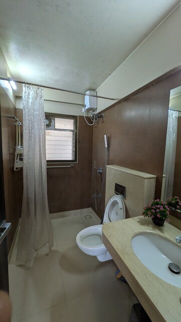 Bathroom in 2 BHK Apartment at Kalpataru Hills, Manpada – for Rent