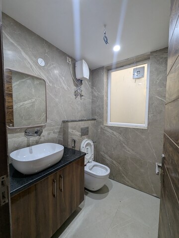 Bathroom in 2 BHK Apartment at Smart World Orchard, Sector 61 – for Sale