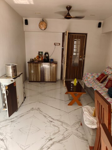 Living Room in 2 BHK Apartment at Lokhandwala Whispering Palms, Kandivali East – for Rent