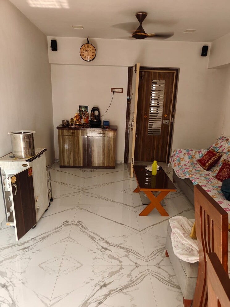 Living Room, lokhandwala-whispering-palms 2 Bedroom 910 Sq.Ft. Apartment In Kandivali East Mumbai 9098376