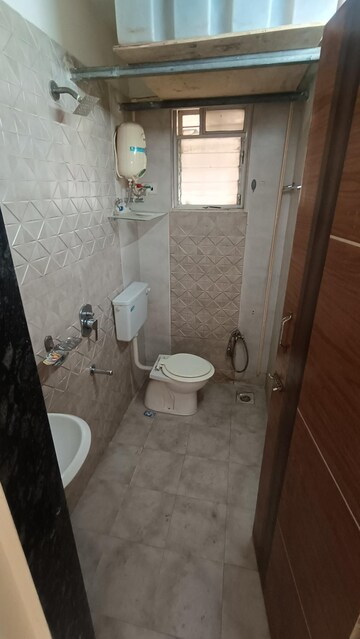 Bathroom in 1 BHK Apartment at Amrutdhara CHS, Kharghar – for Rent