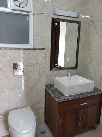 Bathroom in 3 BHK Builder Floor at Kalkaji – for Rent