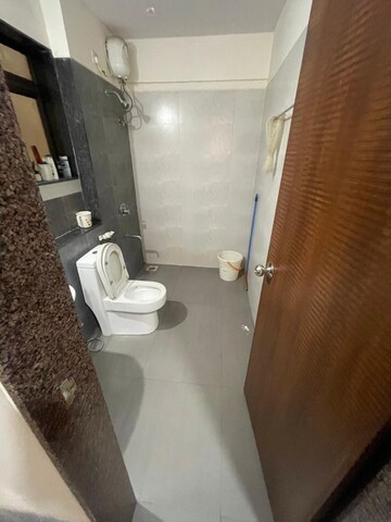 Bathroom in 2 BHK Apartment at Acme Ozone, Manpada – for Sale