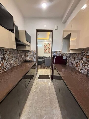 Kitchen in 3 BHK Builder Floor at Freedom Fighters Enclave – for Rent