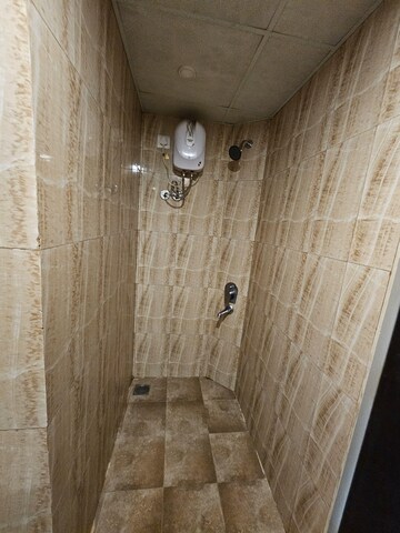 Bathroom in 1 BHK Apartment at Lodha Quality Home Tower 5, Saket Complex – for Rent
