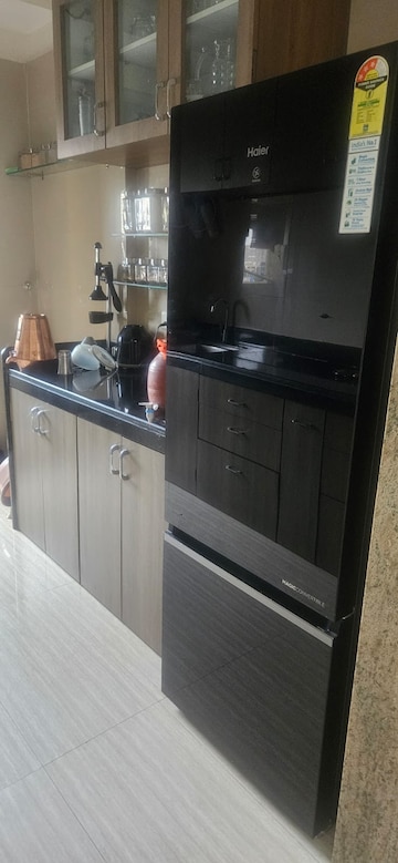 Kitchen in 2 BHK Apartment at Sheth Vasant Oasis, Andheri East – for Rent