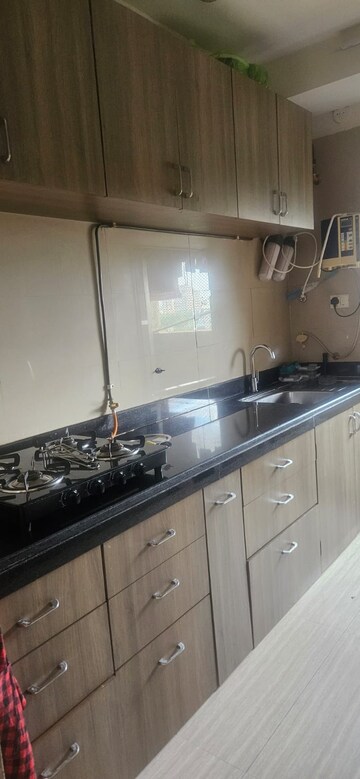 Kitchen in 2 BHK Apartment at Sheth Vasant Oasis, Andheri East – for Rent