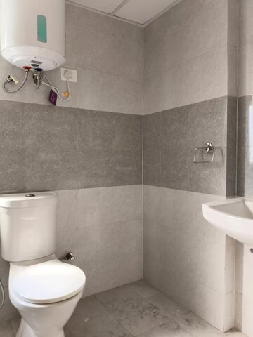 Bathroom in 3 BHK Apartment at Amrapali Leisure Valley, Tech Zone 4 Greater Noida – for Sale
