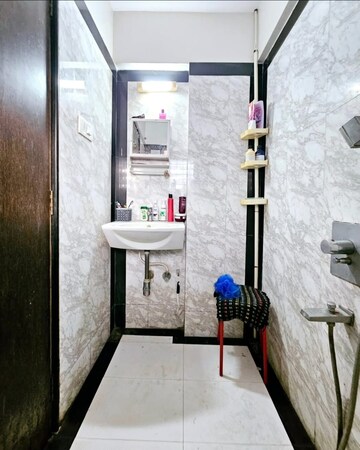 Bathroom in 2 BHK Apartment at Monarch CHS, Andheri East – for Rent
