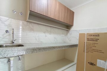 Kitchen in 1 RK Apartment at Paryavaran Complex – for Rent