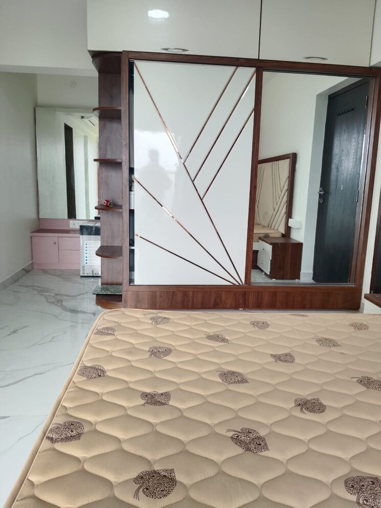 Master Bedroom, rna-ng-eclat 2 Bedroom 801 Sq.Ft. Apartment In Andheri West Mumbai 9099033