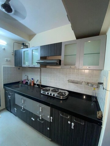 Kitchen in 2 BHK Apartment at Mahavir Kalpavruksha, Ghodbunder Road – for Rent