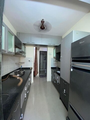 Kitchen in 2 BHK Apartment at Mahavir Kalpavruksha, Ghodbunder Road – for Rent