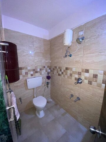 Bathroom in 2 BHK Apartment at Mahavir Kalpavruksha, Ghodbunder Road – for Rent