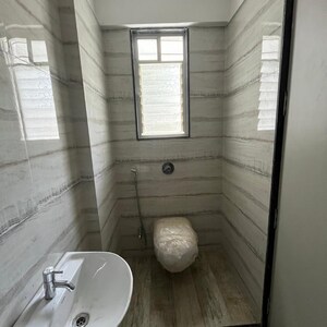 Bathroom in 1 BHK Apartment at Swagat Classic, Model Colony – for Sale