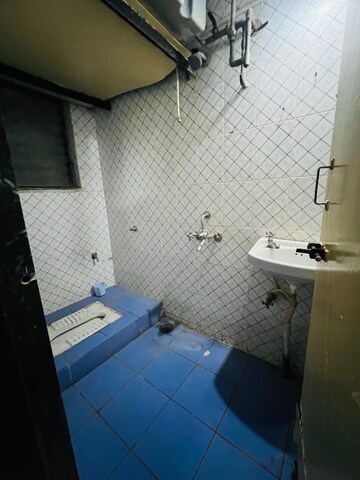 Bathroom in 2 BHK Apartment at Tanishq Apartment, Kharadi – for Rent
