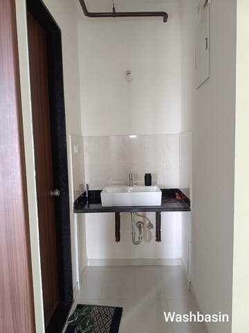 Bathroom in 2 BHK Apartment at Mantra Insignia, Mundhwa – for Rent