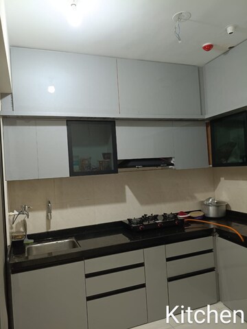 Kitchen in 2 BHK Apartment at Mantra Insignia, Mundhwa – for Rent